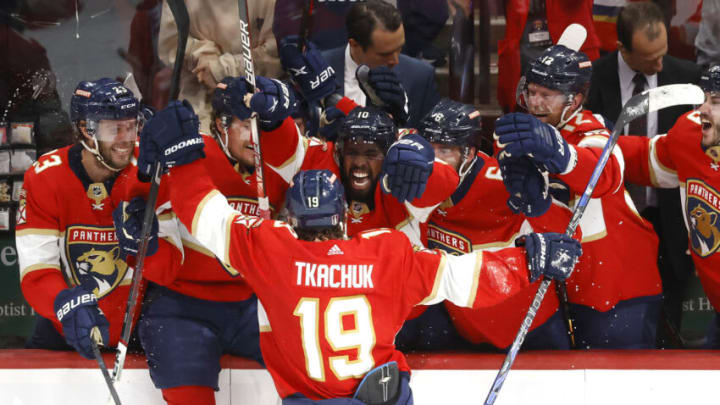 SUNRISE, FLORIDA - MAY 24: Matthew Tkachuk #19 of the Florida Panthers celebrates with his teammates after scoring the game winning goal on Frederik Andersen #31 of the Carolina Hurricanes during the third period in Game Four of the Eastern Conference Final of the 2023 Stanley Cup Playoffs at FLA Live Arena on May 24, 2023 in Sunrise, Florida. (Photo by Joel Auerbach/Getty Images)