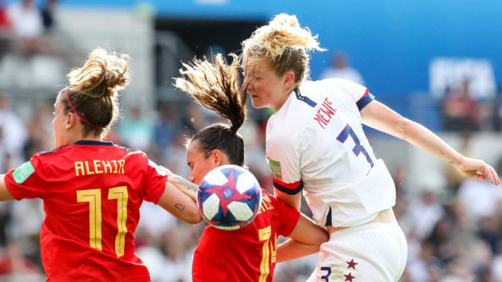 REIMS, FRANCE - JUNE 24: #3 Samantha Mewis of USA competes for the ball during the 2019 FIFA Women's World Cup France Round Of 16 match between Spain and USA at Stade Auguste Delaune on June 24, 2019 in Reims, France. (Photo by Zhizhao Wu/Getty Images)