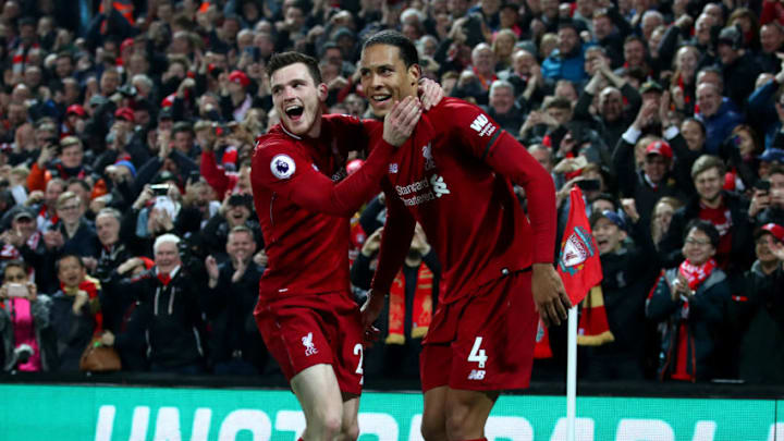 LIVERPOOL, ENGLAND - FEBRUARY 27: Virgil van Dijk of Liverpool celebrates after scoring his team's fifth goal with Andy Robertson of Liverpool during the Premier League match between Liverpool FC and Watford FC at Anfield on February 27, 2019 in Liverpool, United Kingdom. (Photo by Clive Brunskill/Getty Images)