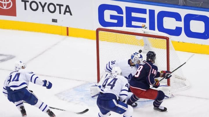 Pierre-Luc Dubois #18 of the Columbus Blue Jackets scores the game-winning goal past Frederik Andersen #31 of the Toronto Maple Leafs. (Photo by Andre Ringuette/Freestyle Photo/Getty Images)