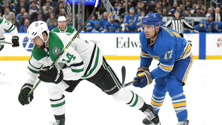 ST. LOUIS, MO – MARCH 02: Dallas Stars leftwing Jamie Benn (14) and St. Louis Blues leftwing Jaden Schwartz (17) go after a loose puck during an NHL game between the Dallas Stars and the St. Louis Blues on March 02, 2019, at Energizer Center, St. Louis, MO. (Photo by Keith Gillett/Icon Sportswire via Getty Images)