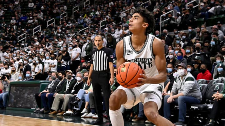 Nov 20, 2021; East Lansing, Michigan, USA; Michigan State Spartans player Max Christie (5) sets up for a shot from the corner at Jack Breslin Student Events Center. Mandatory Credit: Dale Young-USA TODAY Sports