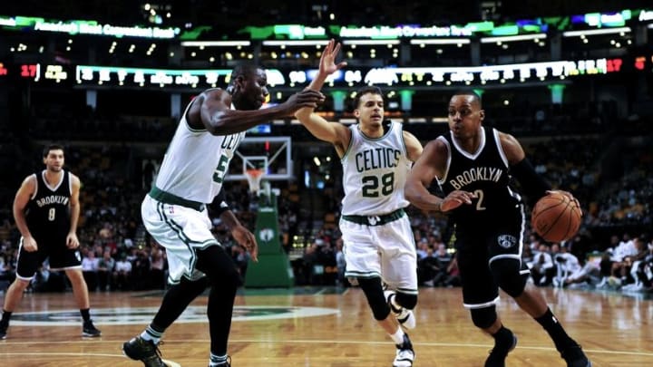Oct 17, 2016; Boston, MA, USA; Brooklyn Nets guard Randy Foye (2) controls the ball while being defended by Boston Celtics forward Ben Bentil (50) and guard R.J. Hunter (28) during the second half at TD Garden. Mandatory Credit: Bob DeChiara-USA TODAY Sports