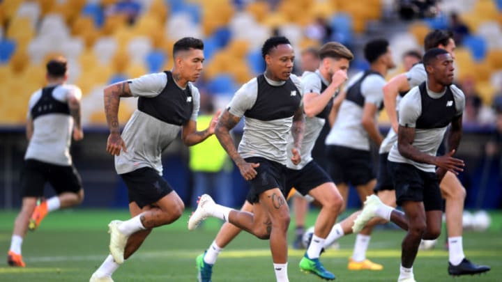 KIEV, UKRAINE - MAY 25: Roberto Firmino of Liverpool and Nathaniel Clyne of Liverpool in action during a Liverpool training session ahead of the UEFA Champions League Final against Real Madrid at NSC Olimpiyskiy Stadium on May 25, 2018 in Kiev, Ukraine. (Photo by Laurence Griffiths/Getty Images)