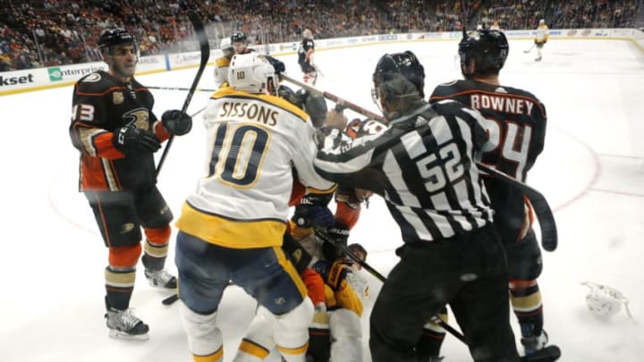 ANAHEIM, CALIFORNIA - MARCH 12: Members of the Anaheim Ducks and the Nashville Predators fight during the second period at Honda Center on March 12, 2019 in Anaheim, California. (Photo by Katharine Lotze/Getty Images)