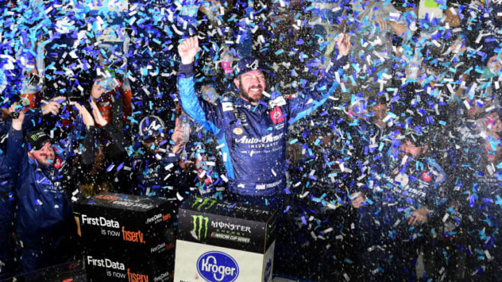 MARTINSVILLE, VIRGINIA - OCTOBER 27: Martin Truex Jr, driver of the #19 Auto Owners Insurance Toyota, celebrates in Victory Lane after winning the Monster Energy NASCAR Cup Series First Data 500 at Martinsville Speedway on October 27, 2019 in Martinsville, Virginia. (Photo by Jared C. Tilton/Getty Images)