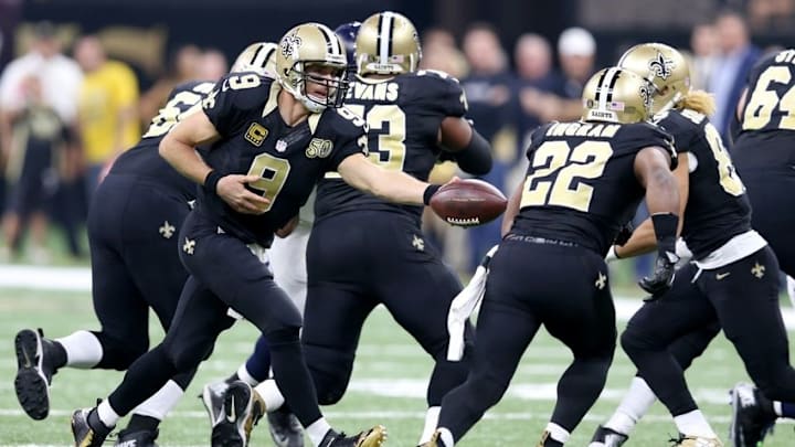 Oct 30, 2016; New Orleans, LA, USA; New Orleans Saints quarterback Drew Brees (9) hands off to running back Mark Ingram (22) in the first quarter against the Seattle Seahawks at the Mercedes-Benz Superdome. Mandatory Credit: Chuck Cook-USA TODAY Sports