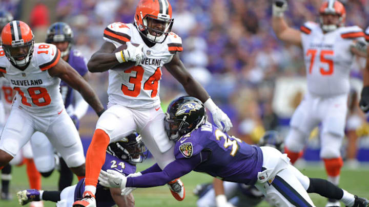 The Baltimore Ravens' Eric Weddle (32) makes a tackle on Cleveland Browns running back Isaiah Crowell (34) on September 17, 2017 at M