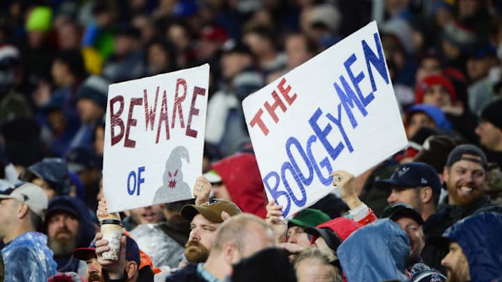 FOXBOROUGH, MA - OCTOBER 27: Fans hold up signs of support for the New England Patriots defense in the second half against the Cleveland Browns at Gillette Stadium on October 27, 2019 in Foxborough, Massachusetts. (Photo by Kathryn Riley/Getty Images)