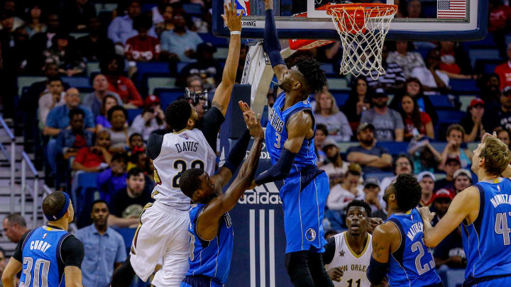 Mar 29, 2017; New Orleans, LA, USA; Dallas Mavericks center Nerlens Noel (3) blocks a shot by New Orleans Pelicans forward Anthony Davis (23) during the second quarter of a game at the Smoothie King Center. Mandatory Credit: Derick E. Hingle-USA TODAY Sports