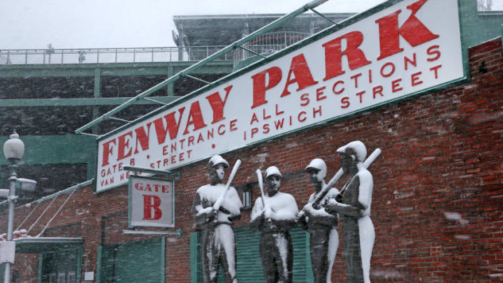 BOSTON, MA - MARCH 13: Snow accumulates on the 'Teammates' sculpture outside Fenway Park in Boston during the third nor'easter storm to hit the region in two weeks on March 13, 2018. (Photo by David L. Ryan/The Boston Globe via Getty Images)