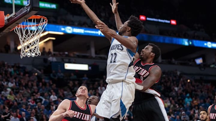 Jan 1, 2017; Minneapolis, MN, USA; Minnesota Timberwolves guard Andrew Wiggins (22) shoots in the fourth quarter against the Portland Trail Blazers forward Al-Farouq Aminu (8) at Target Center. The Portland Trail Blazers beat the Minnesota Timberwolves 95-89. Mandatory Credit: Brad Rempel-USA TODAY Sports
