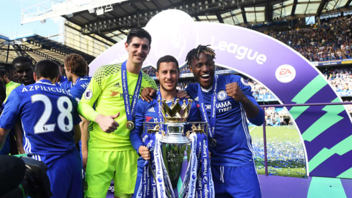 LONDON, ENGLAND - MAY 21: Thibaut Courtois of Chelsea, Eden Hazard of Chelsea and Michy Batshuayi of Chelse pose with the Premier League Trophy after the Premier League match between Chelsea and Sunderland at Stamford Bridge on May 21, 2017 in London, England. (Photo by Michael Regan/Getty Images)