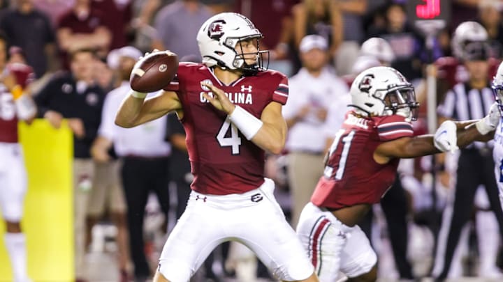 Sep 25, 2021; Columbia, South Carolina, USA; South Carolina Gamecocks quarterback Luke Doty (4) throws a pass against the Kentucky Wildcats in the fourth quarter at Williams-Brice Stadium. Mandatory Credit: Jeff Blake-USA TODAY Sports