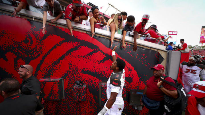 TAMPA, FL - NOVEMBER 25: Quarterback Jameis Winston #3 of the Tampa Bay Buccaneers high fives fans after the game against the San Francisco 49ers at Raymond James Stadium on November 25, 2018 in Tampa, Florida. The Tampa Bay Buccaneers defeated the San Francisco 49ers 27-9. (Photo by Will Vragovic/Getty Images)