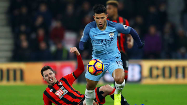 BOURNEMOUTH, ENGLAND - FEBRUARY 13: Sergio Aguero of Manchester City battles for the ball with Adam Smith of Bournemouth during the Premier League match between AFC Bournemouth and Manchester City at Vitality Stadium on February 13, 2017 in Bournemouth, England. (Photo by Michael Steele/Getty Images)