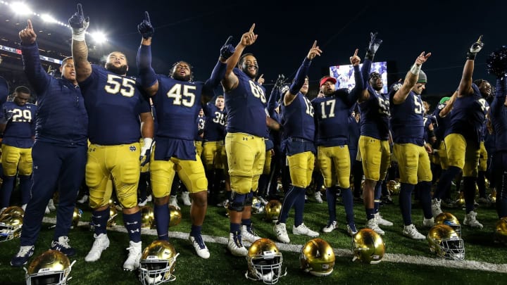 SOUTH BEND, INDIANA – NOVEMBER 16: The Notre Dame Fighting Irish sing after beating the Navy Midshipmen 52-20 at Notre Dame Stadium on November 16, 2019 in South Bend, Indiana. (Photo by Dylan Buell/Getty Images)