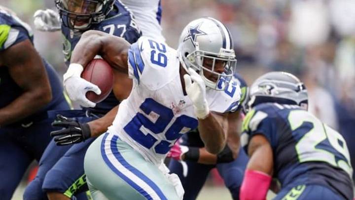 Oct 12, 2014; Seattle, WA, USA; Dallas Cowboys running back DeMarco Murray (29) rushes for a touchdown against the Seattle Seahawks during the fourth quarter of a 26-20 Dallas victory at CenturyLink Field. Mandatory Credit: Joe Nicholson-USA TODAY Sports Oct 12, 2014; Seattle, WA, USA; Dallas Cowboys running back DeMarco Murray (29) rushes for a touchdown against the Seattle Seahawks during the fourth quarter of a 26-20 Dallas victory at CenturyLink Field. Mandatory Credit: Joe Nicholson-USA TODAY Sports