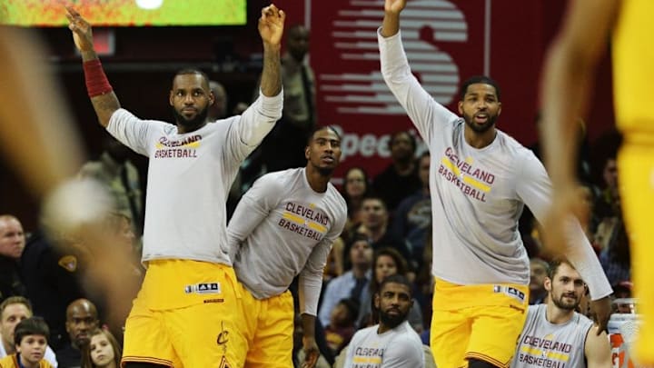 Nov 25, 2016; Cleveland, OH, USA; Cleveland Cavaliers forward LeBron James (23) and center Tristan Thompson (13) and guard Iman Shumpert (4) cheer from the bench during the fourth quarter against the Dallas Mavericks at Quicken Loans Arena. The Cavs won 128-90. Mandatory Credit: Ken Blaze-USA TODAY Sports