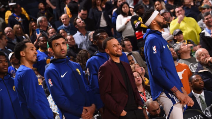 OAKLAND, CA - MARCH 16: Stephen Curry #30 of the Golden State Warriors looks on during the game against the Sacramento Kings on March 16, 2018 at ORACLE Arena in Oakland, California. NOTE TO USER: User expressly acknowledges and agrees that, by downloading and or using this photograph, user is consenting to the terms and conditions of Getty Images License Agreement. Mandatory Copyright Notice: Copyright 2018 NBAE (Photo by Noah Graham/NBAE via Getty Images)