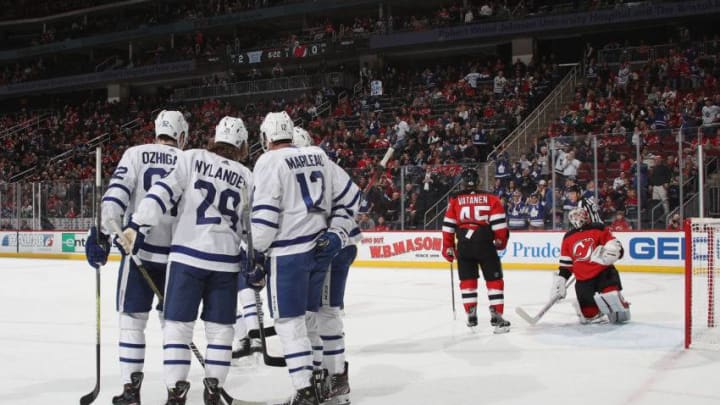 Patrick Marleau #12 of the Toronto Maple Leafs celebrates his first period goal along with William Nylander #29 against Keith Kinkaid #1 of the New Jersey Devils. (Photo by Bruce Bennett/Getty Images)