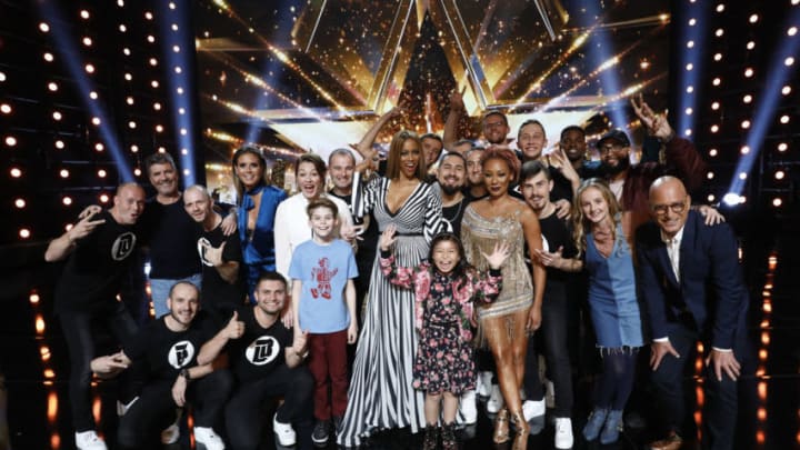 AMERICA'S GOT TALENT -- "Live Results 2" -- Pictured: (l-r) Light Balance, Heidi Klum, Mandy Harvey, Merrick Hanna, Tyra Banks, Celine Tam, Mel B, Johnny Manuel, Evie Clair, Eric Jones, Howie Mandel -- (Photo by: Trae Patton/NBC)