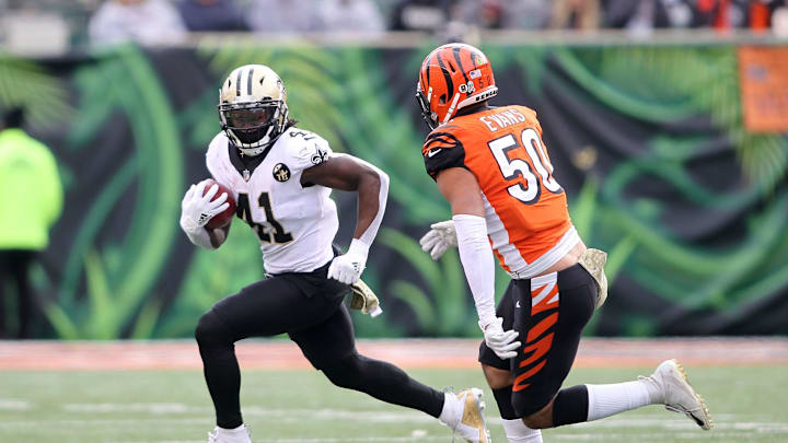 CINCINNATI, OH – NOVEMBER 11: Alvin Kamara #41 of the New Orleans Saints attempts to run the ball past Jordan Evans #50 of the Cincinnati Bengals during the second quarter at Paul Brown Stadium on November 11, 2018 in Cincinnati, Ohio. (Photo by John Grieshop/Getty Images)