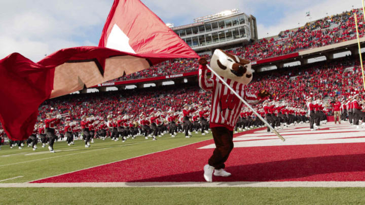Oct 30, 2021; Madison, Wisconsin, USA; Wisconsin Badgers mascot Bucky Badger waves the Wisconsin flag prior to the game against the Iowa Hawkeyes at Camp Randall Stadium. Mandatory Credit: Jeff Hanisch-USA TODAY Sports