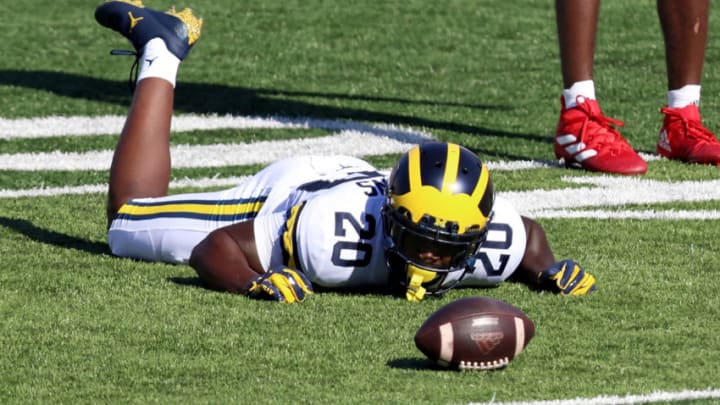 BLOOMINGTON, INDIANA - NOVEMBER 07: Brad Hawkins #20 of the Michigan Wolverines lays on the field after breaking up a play during the second quarter against the Indiana Hoosiers at Memorial Stadium on November 07, 2020 in Bloomington, Indiana. (Photo by Justin Casterline/Getty Images)