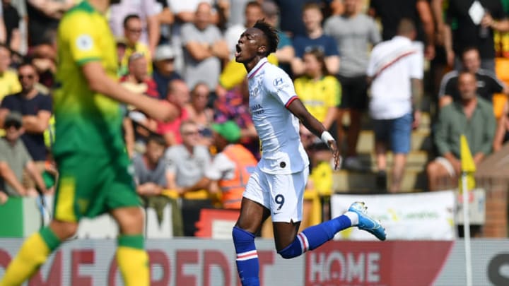 Chelsea's English striker Tammy Abraham celebrates after scoring the opening goal of the English Premier League football match between Norwich City and Chelsea at Carrow Road in Norwich, eastern England on August 24, 2019. (Photo by Daniel LEAL-OLIVAS / AFP) / RESTRICTED TO EDITORIAL USE. No use with unauthorized audio, video, data, fixture lists, club/league logos or 'live' services. Online in-match use limited to 120 images. An additional 40 images may be used in extra time. No video emulation. Social media in-match use limited to 120 images. An additional 40 images may be used in extra time. No use in betting publications, games or single club/league/player publications. / (Photo credit should read DANIEL LEAL-OLIVAS/AFP/Getty Images)