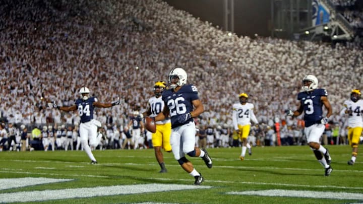 STATE COLLEGE, PA - OCTOBER 21: Saquon Barkley #26 of the Penn State Nittany Lions rushes for a 69 yard touchdown in the first half against the Michigan Wolverines on October 21, 2017 at Beaver Stadium in State College, Pennsylvania. (Photo by Justin K. Aller/Getty Images)