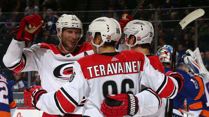 NEW YORK, NY – NOVEMBER 16: Sebastian Aho #20 of the Carolina Hurricanes celebrates his second period goal against the New York Islanders with teammates Teuvo Teravainen #86 and Jordan Staal #11 at Barclays Center on November 16, 2017 in New York City. (Photo by Mike Stobe/NHLI via Getty Images)