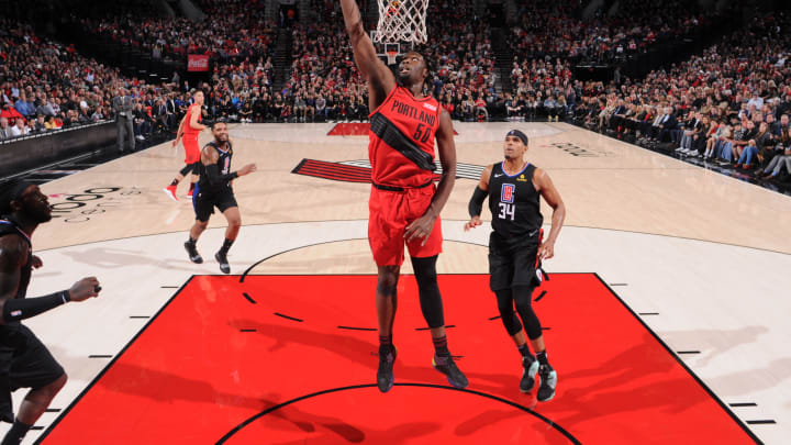 PORTLAND, OR – NOVEMBER 8: Caleb Swanigan #50 of the Portland Trail Blazers drives to the basket during the game against the LA Clippers on November 8 2018 at the Moda Center Arena in Portland, Oregon. NOTE TO USER: User expressly acknowledges and agrees that, by downloading and or using this photograph, user is consenting to the terms and conditions of the Getty Images License Agreement. Mandatory Copyright Notice: Copyright 2018 NBAE (Photo by Sam Forencich/NBAE via Getty Images)