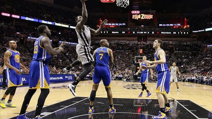 May 6, 2013; San Antonio, TX, USA; San Antonio Spurs forward DeJuan Blair (45) drives to the basket against the Golden State Warriors during the first half in game one of the second round of the 2013 NBA Playoffs at the AT