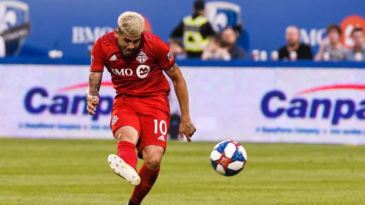 MONTREAL, QC – JULY 13: Toronto FC midfielder Alejandro Pozuelo (10) shoots the ball during the Toronto FC versus the Montreal Impact game on July 13, 2019, at Stade Saputo in Montreal, QC (Photo by David Kirouac/Icon Sportswire via Getty Images)