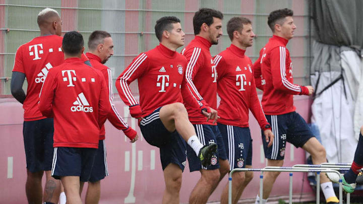 MUNICH, GERMANY - SEPTEMBER 14: (EXCLUSIVE COVERAGE) Jerome Boateng, Rafinha, Franck Ribery, James Rodriguez, Mats Hummels, Thomas Mueller and Robert Lewandowski (L-R) of FC Bayern Muenchen warm up during a training session at the club's Saebener Strasse training ground on September 14, 2017 in Munich, Germany. (Photo by A. Beier/Getty Images for FC Bayern)