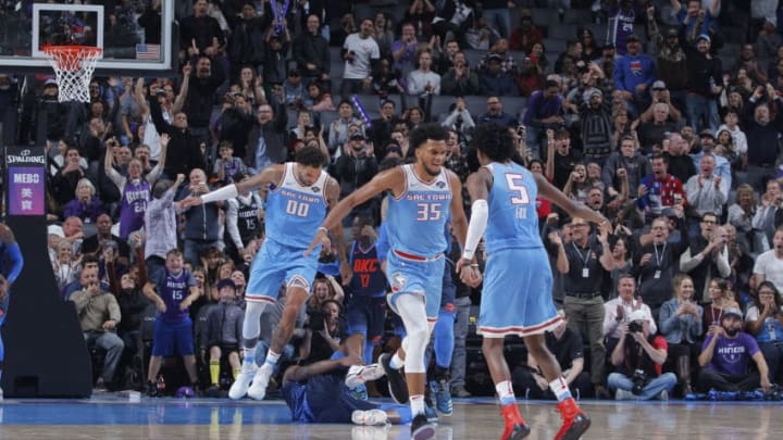 SACRAMENTO, CA - NOVEMBER 19: Marvin Bagley III #35 and De'Aaron Fox #5 of the Sacramento Kings celebrate during the game against the Oklahoma City Thunder on November 19, 2018 at Golden 1 Center in Sacramento, California. NOTE TO USER: User expressly acknowledges and agrees that, by downloading and or using this photograph, User is consenting to the terms and conditions of the Getty Images Agreement. Mandatory Copyright Notice: Copyright 2018 NBAE (Photo by Rocky Widner/NBAE via Getty Images)