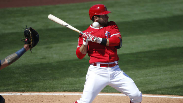 TEMPE, ARIZONA - MARCH 18: David Fletcher #22 of the Los Angeles Angels leans back to avoid a high inside pitch against the Milwaukee Brewers during the first inning of the MLB spring training baseball game at Tempe Diablo Stadium on March 18, 2021 in Tempe, Arizona. (Photo by Ralph Freso/Getty Images)