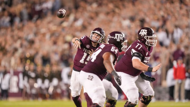 Oct 29, 2022; College Station, Texas, USA; Texas A&M Aggies quarterback Conner Weigman (15) throws a pass against the Mississippi Rebels in the second half at Kyle Field. Mandatory Credit: Daniel Dunn-USA TODAY Sports