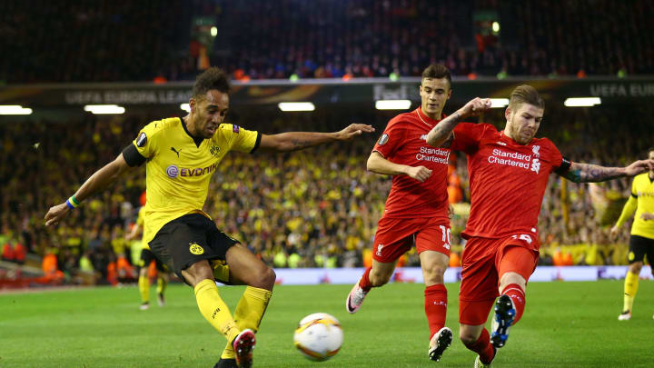 LIVERPOOL, ENGLAND – APRIL 14: Pierre-Emerick Aubameyang of Borussia Dortmund is challenged by Alberto Moreno of Liverpool during the UEFA Europa League quarter final, second leg match between Liverpool and Borussia Dortmund at Anfield on April 14, 2016 in Liverpool, United Kingdom. (Photo by Clive Brunskill/Getty Images)