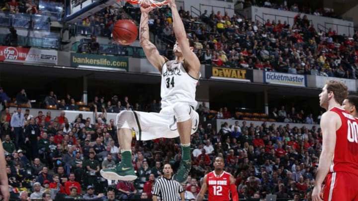 INDIANAPOLIS, IN - MARCH 11: Gavin Schilling #34 of the Michigan State Spartans dunks against the Ohio State Buckeyes in the quarterfinal round of the Big Ten Basketball Tournament at Bankers Life Fieldhouse on March 11, 2016 in Indianapolis, Indiana. Michigan State defeated Ohio State 81-54. (Photo by Joe Robbins/Getty Images)