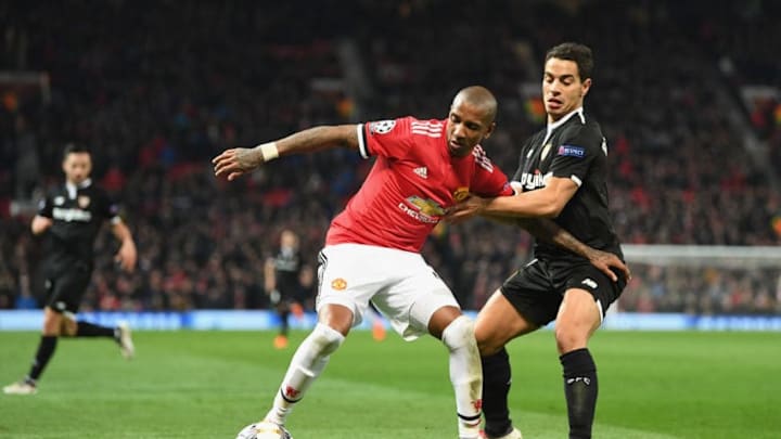 MANCHESTER, ENGLAND - MARCH 13: Ashley Young of Manchester United battles Wissam Ben Yedder of Seville during the UEFA Champions League Round of 16 Second Leg match between Manchester United and Sevilla FC at Old Trafford on March 13, 2018 in Manchester, United Kingdom. (Photo by Michael Regan/Getty Images)