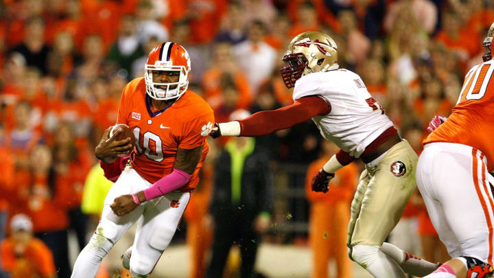 CLEMSON, SC – OCTOBER 19: Tajh Boyd #10 of the Clemson Tigers rushes for a first down during the game against the Florida State Seminoles at Memorial Stadium on October 19, 2013 in Clemson, South Carolina. (Photo by Tyler Smith/Getty Images)