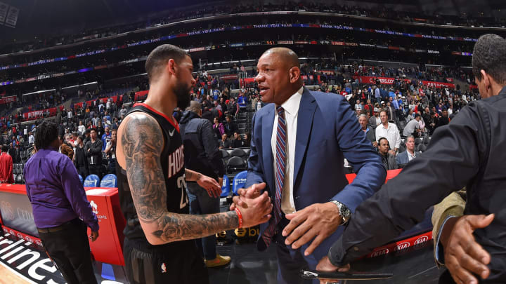LOS ANGELES, CA – APRIL 3: Head Coach Doc Rivers of the LA Clippers and Austin Rivers #25 of the Houston Rockets after a game on April 3, 2019 at STAPLES Center in Los Angeles, California. NOTE TO USER: User expressly acknowledges and agrees that, by downloading and/or using this Photograph, user is consenting to the terms and conditions of the Getty Images License Agreement. Mandatory Copyright Notice: Copyright 2019 NBAE (Photo by Andrew D. Bernstein/NBAE via Getty Images)
