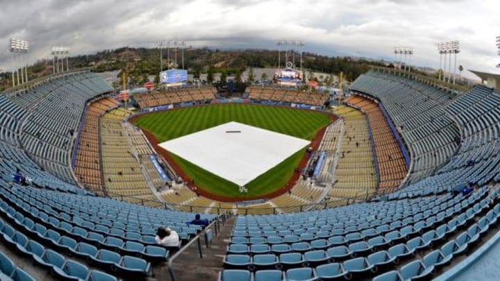 May 14, 2015; Los Angeles, CA, USA; A general view of a tarp that covers the field due to the threat of rain prior to the game between Los Angeles Dodgers and the Colorado Rockies at Dodger Stadium. Mandatory Credit: Jayne Kamin-Oncea-USA TODAY Sports