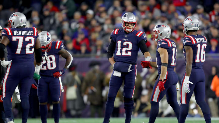 FOXBOROUGH, MASSACHUSETTS – OCTOBER 10: Tom Brady #12 of the New England Patriots talks with Julian Edelman #11 after a play against the New York Giants during the second quarter in the game at Gillette Stadium on October 10, 2019 in Foxborough, Massachusetts. (Photo by Maddie Meyer/Getty Images)