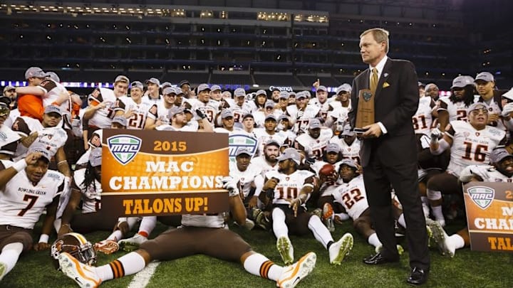 Dec 4, 2015; Detroit, MI, USA; Mac commissioner Jon Steinbrecher prepares to award trophies to the Bowling Green Falcons for winning the MAC Championship against the Northern Illinois Huskies at Ford Field. Bowling Green won 34-14. Mandatory Credit: Rick Osentoski-USA TODAY Sports