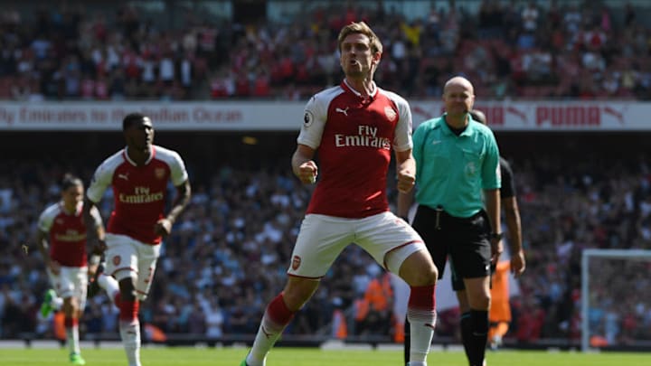 LONDON, ENGLAND - APRIL 22: Nacho Monreal of Arsenal celebrates scoring his side's first goal during the Premier League match between Arsenal and West Ham United at Emirates Stadium on April 22, 2018 in London, England. (Photo by Shaun Botterill/Getty Images)