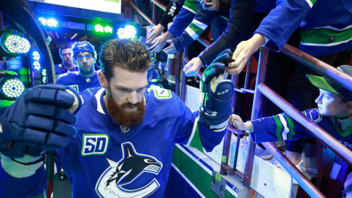 VANCOUVER, BC - OCTOBER 28: Jordie Benn #4 of the Vancouver Canucks walks out to the ice during their NHL game against the Florida Panthers at Rogers Arena October 28, 2019 in Vancouver, British Columbia, Canada. (Photo by Jeff Vinnick/NHLI via Getty Images)"n
