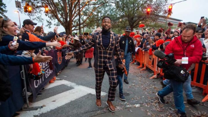 Auburn football interim head coach Carnell "Cadillac" Williams greets fans during tiger walk before Auburn Tigers take on Texas A&M at Jordan-Hare Stadium in Auburn, Ala., on Saturday, Nov. 12, 2022.